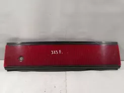 Ліхтарі задньої кришки багажника Mazda 323 0674434