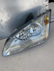 Фара Ford Focus 4M5113W030AC 10110102A 1017