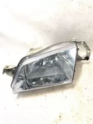 Фара Mazda 323 205572B 0152110