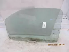 Скло задніх дверей Ford Mondeo MK II 1077079