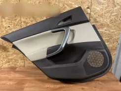 Opel Insignia A Бічні панелі / Обшивка задніх дверей 13277445 00295436 79ME34