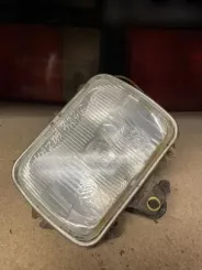 Фара Mazda 323 F 02104R20