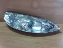 Фара Peugeot 407 0301213202 9660235980
